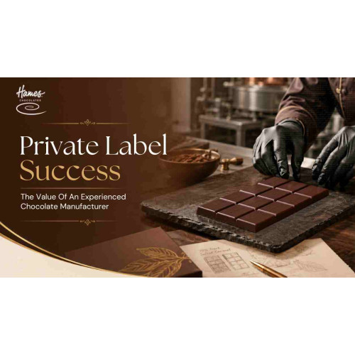 Gloved chocolatier arranging premium chocolate bars and pralines for private label chocolate manufacturing.