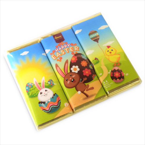 Hames - Happy Easter 50g Trio Milk Chocolate Bars Presented in a Clear PVC Sleeve Wrapped in Gold Foil Finished with 3 Cute Easter Wrapper Designs