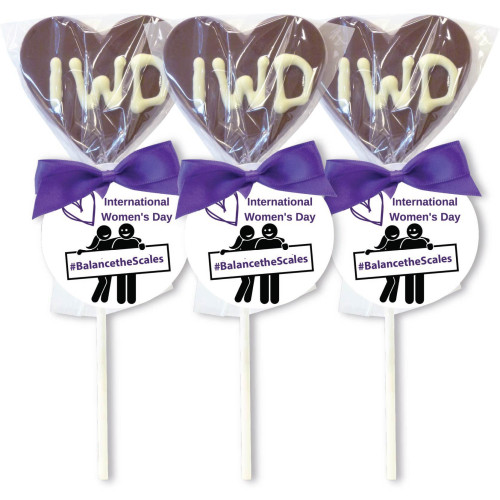 International Day - Hand Piped with White Chocolate on a Milk Chocolate Lollipop with International Womens Day 2026 Swing Tag and Purple Twist Tie Bow